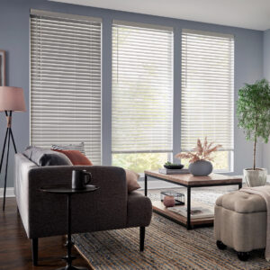 Exquisite Faux Wood Blinds in white neutral tone installed on living room window with wand tilt