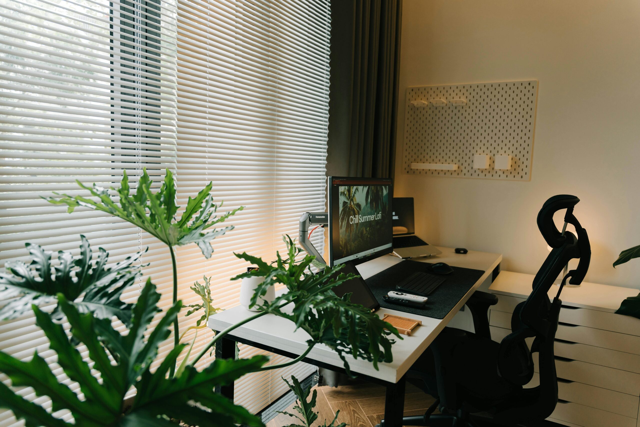 Sheer shades used in home office for light filtering