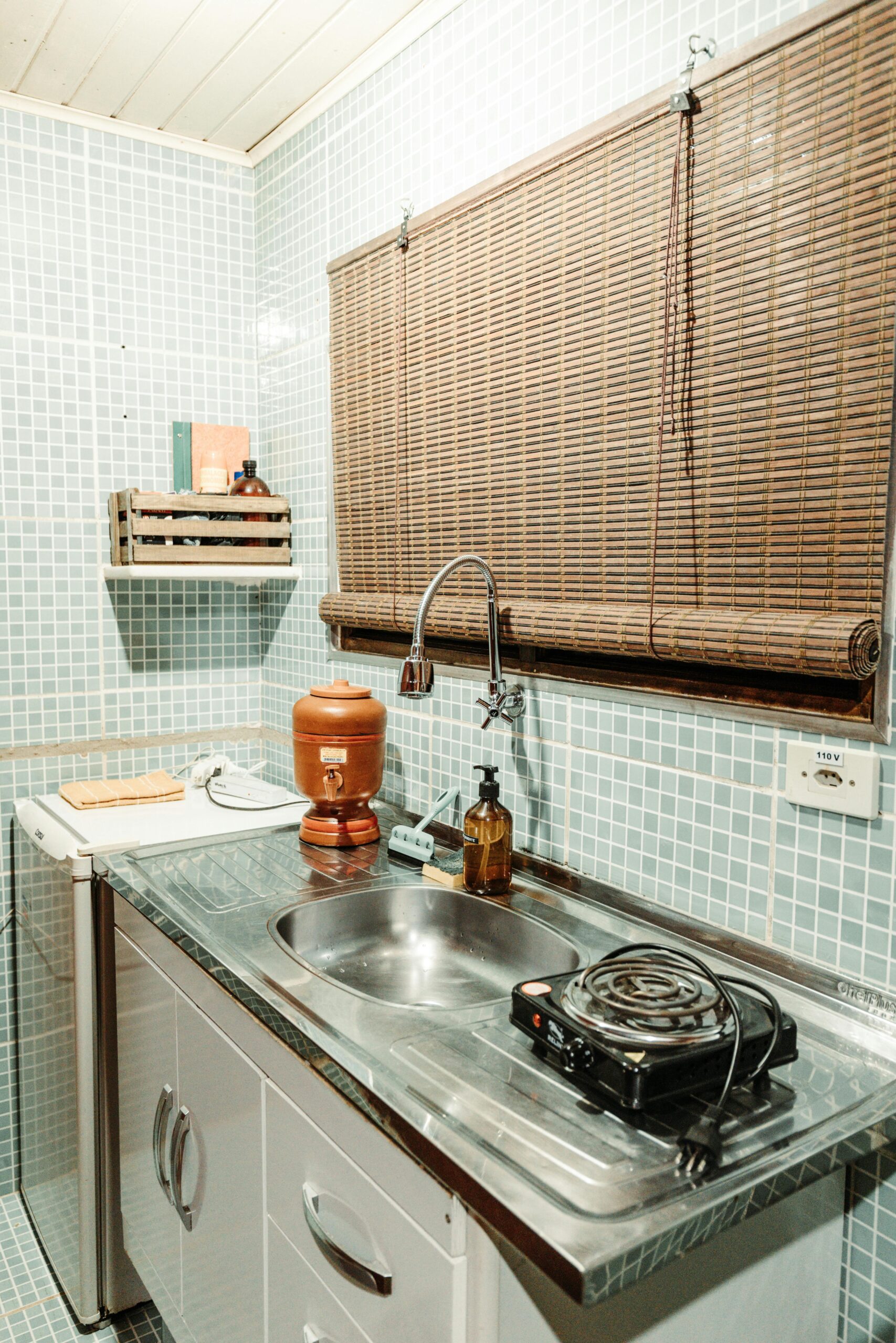 Kitchen having bamboo shades