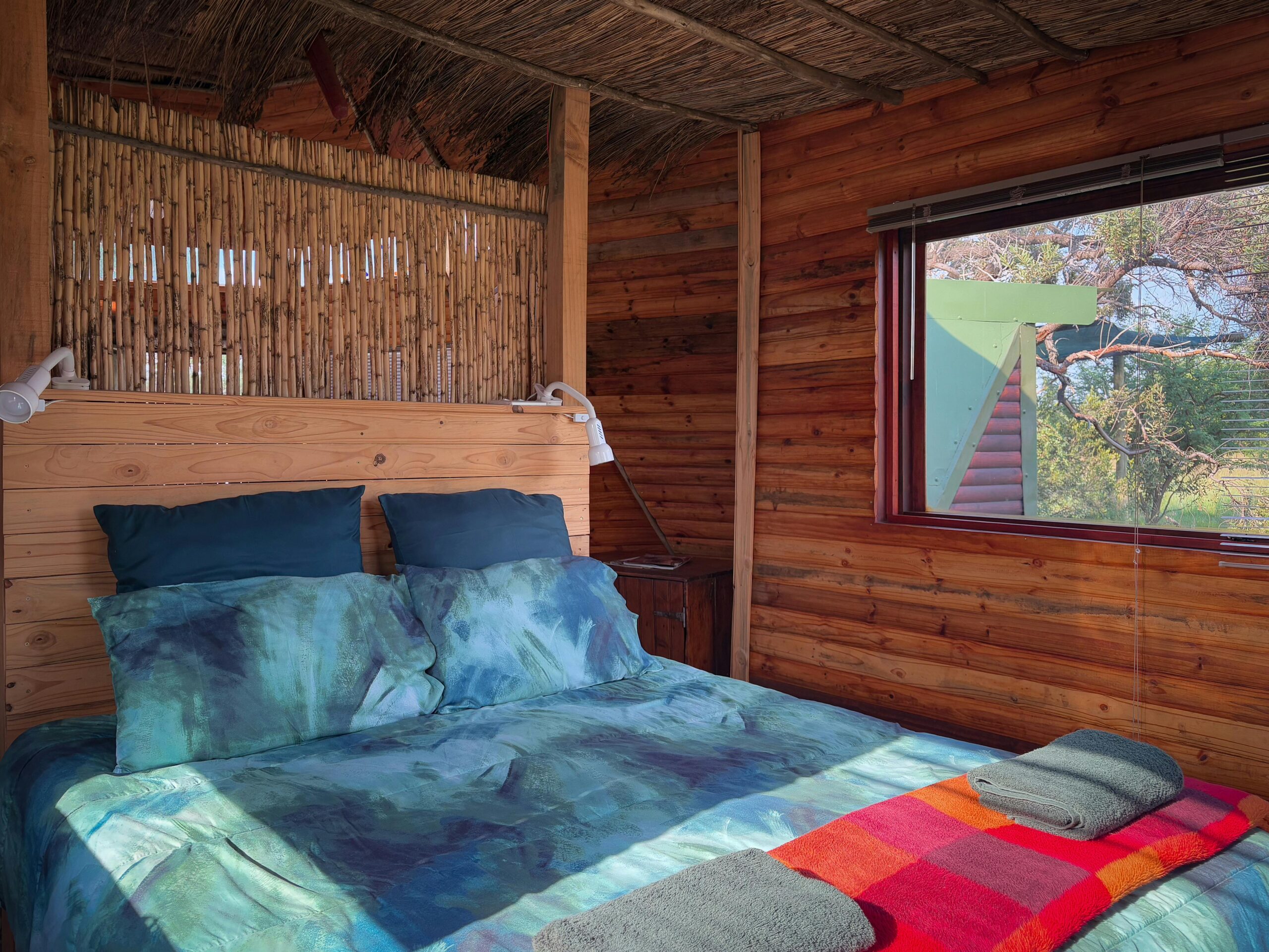 Bedroom having wooven shades or bamboo shades install