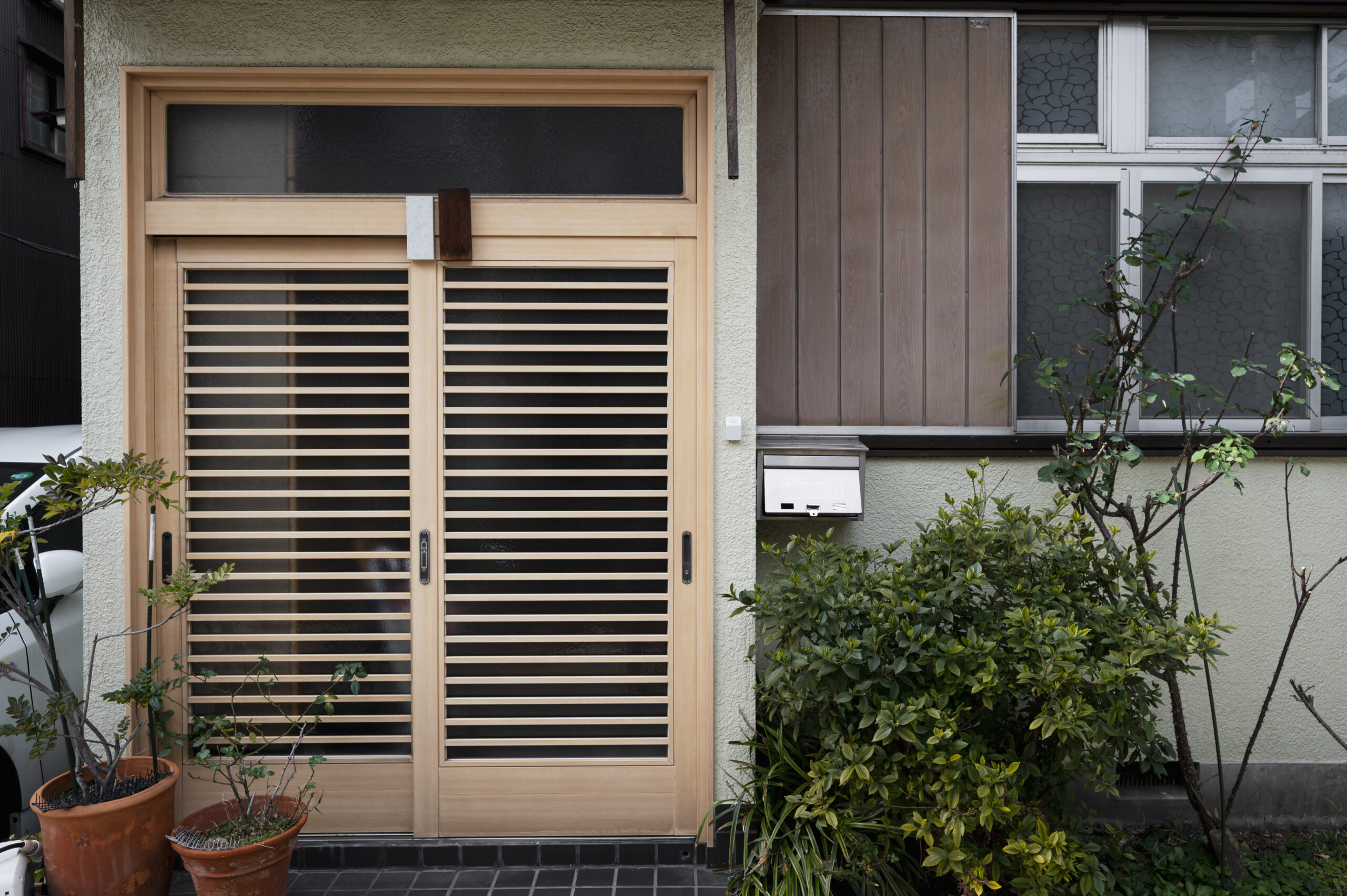 Premium Real Wood Blinds installed in Window of Home
